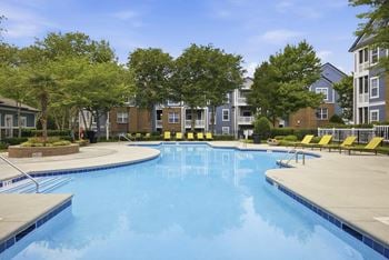 Two refreshing swimming pools with expansive sundecks